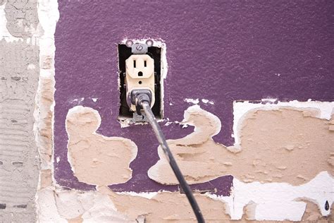 gap between flush metal box and repaired plaster|filling gaps around socket box.